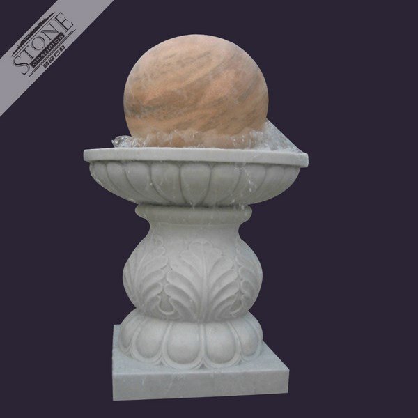 Marble Floating sphere with a carved base