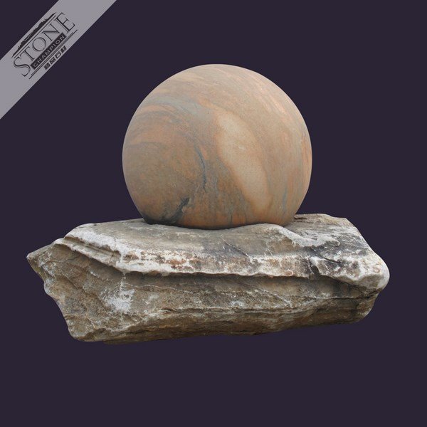 Red marble ball fountain with rock stone base