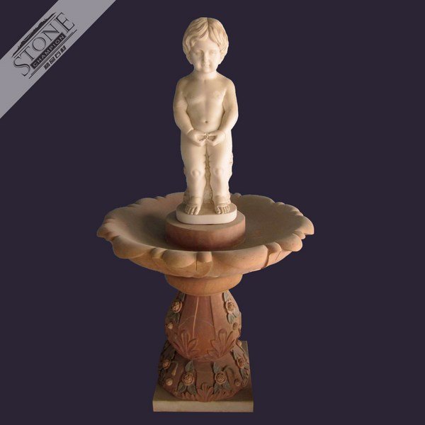Boy peeing natural marble water fountain