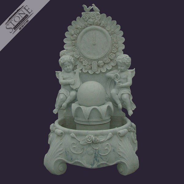 Hand carved white marble wall fountain with ball